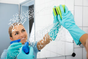 Commercial cleaning in Cardiff cleaner wipe mirror